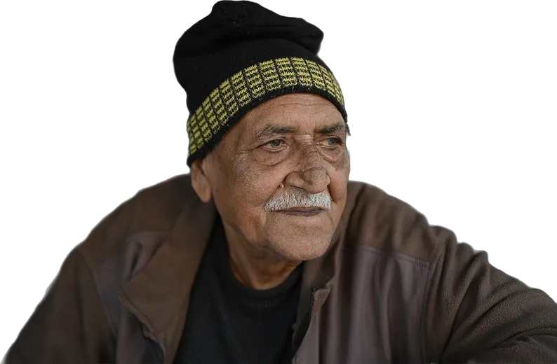 A smiling shop owner